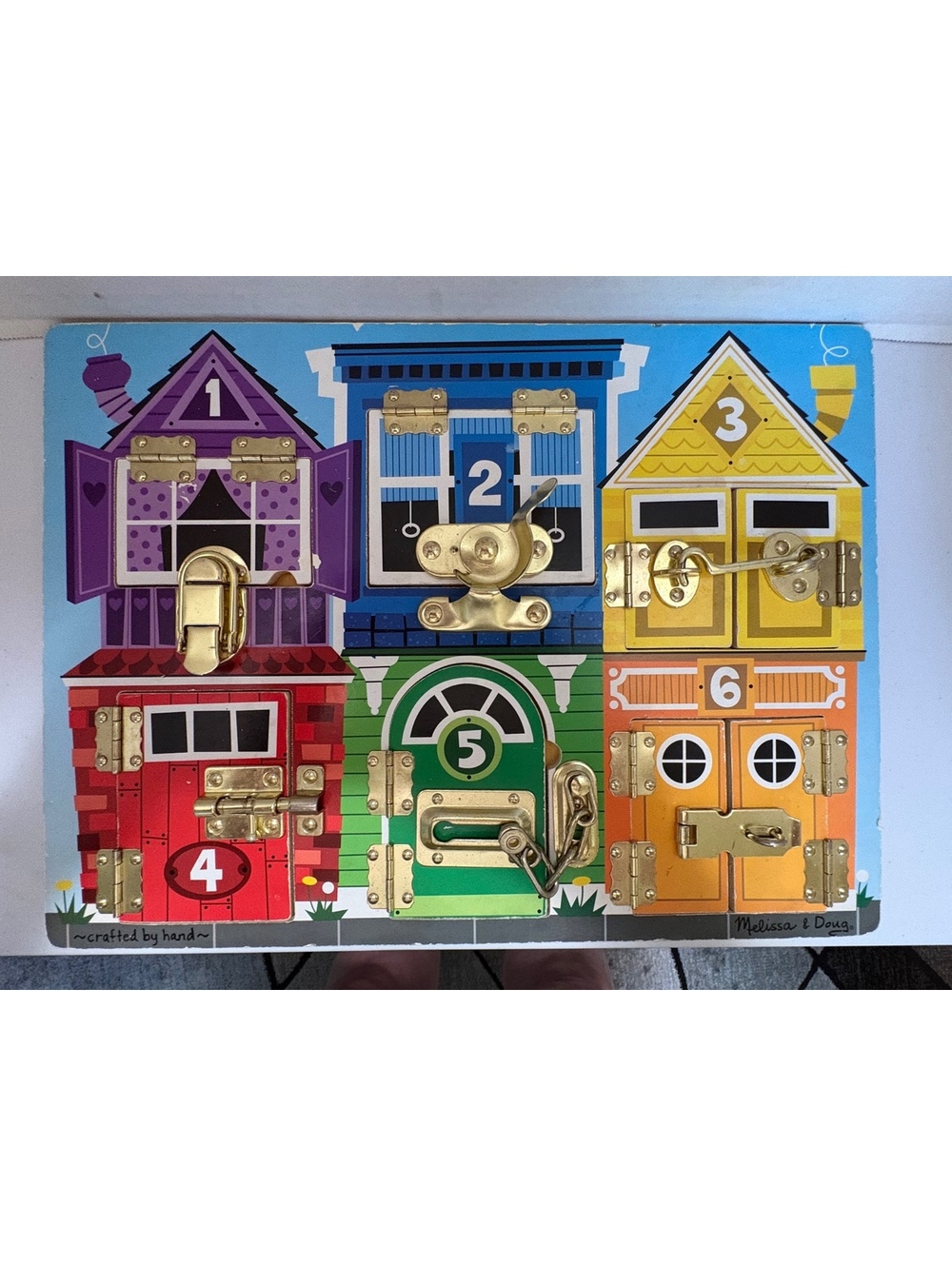 Melissa and Doug latches board